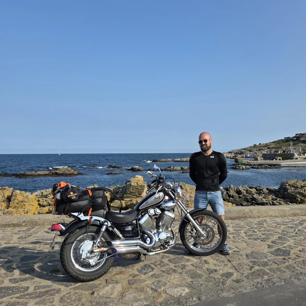 Frederik Smal with his motorbike, packed for a touring trip along the coast